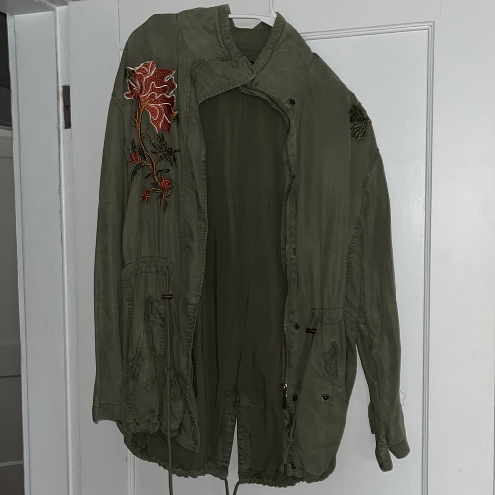 Green jacket with flowers